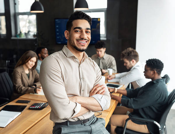 Smiling man in office